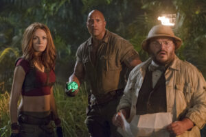 Karen Gillan, Dwayne Johnson and Jack Black star in JUMANJI: WELCOME TO THE JUNGLE.